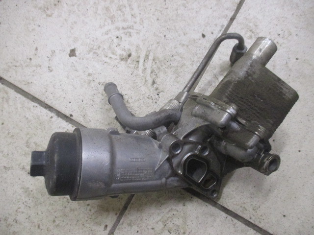 Корпус масляного фильтра Opel Astra J 2009-2015 на Opel Astra J