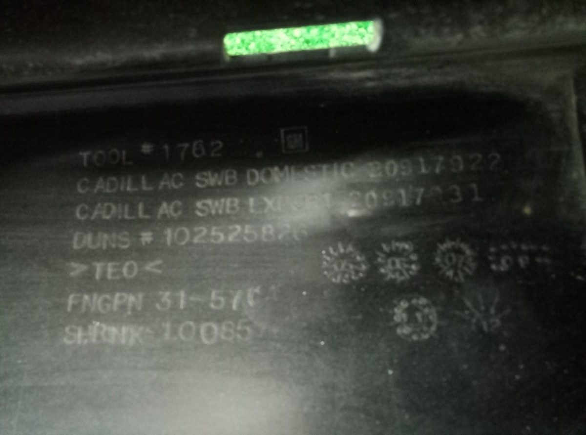 Бампер задний Cadillac Escalade 3 2006-2014  20917922 на Cadillac Escalade 3