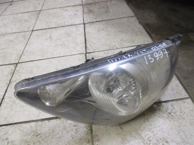 Фара левая Honda Fit Aria  2002-2008 на Honda Fit Aria 
