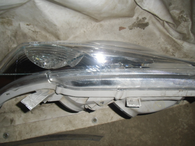 Фара левая Toyota Highlander 2 (U40) 2007-2010 на Toyota Highlander 2 (U40)