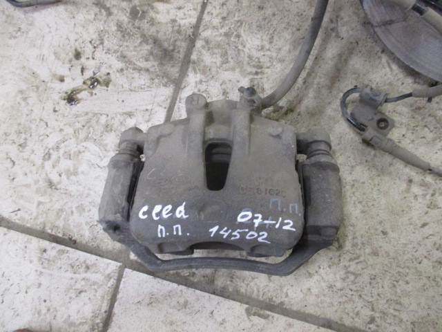 Суппорт передний правый Kia Ceed (ED) 2006-2012 на Kia Ceed (ED)